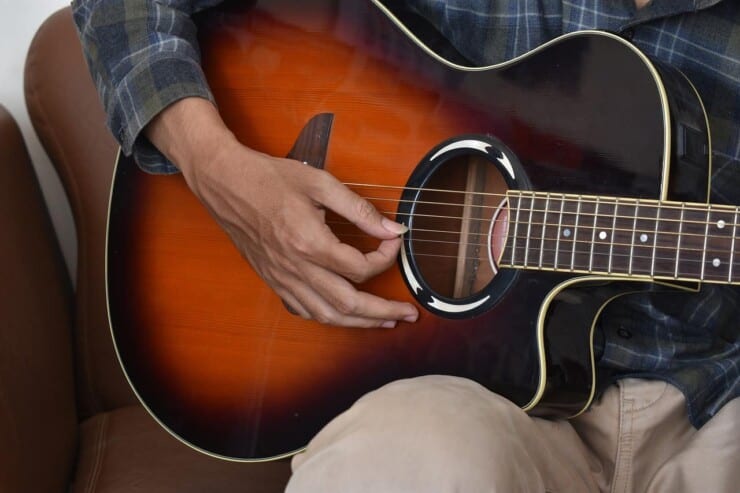 Acoustic Guitar Strumming with Thumb and Index Finger