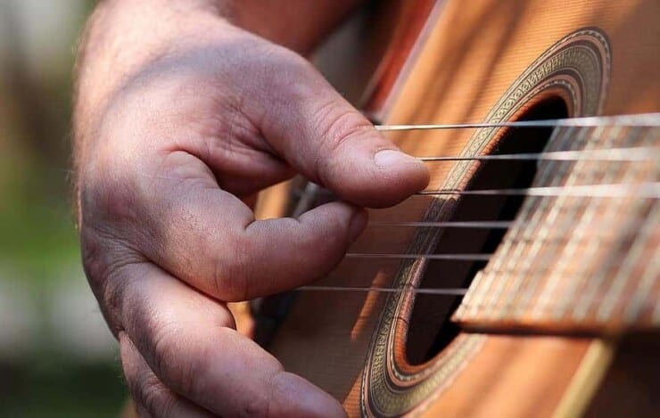 How to Strum a Guitar Without a Pick - 
Acoustic Guitar - Thumb Strumming