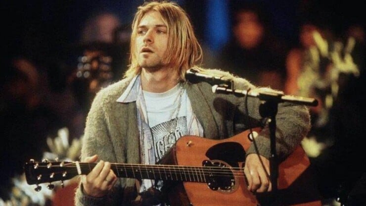 kurt cobain playing guitar