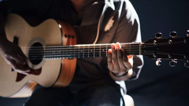 man playing guitar