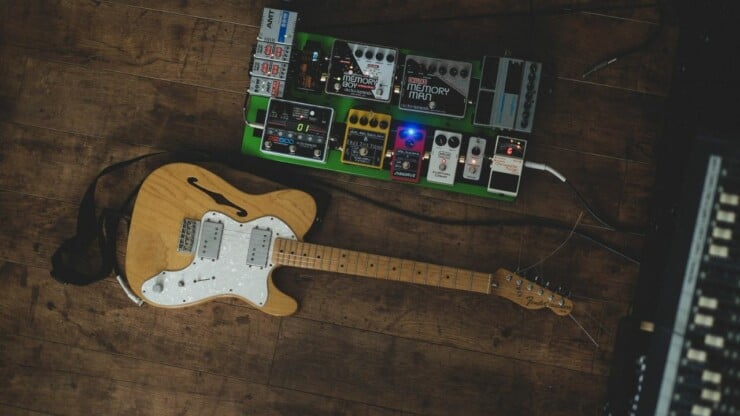 pedalboard and guitar
